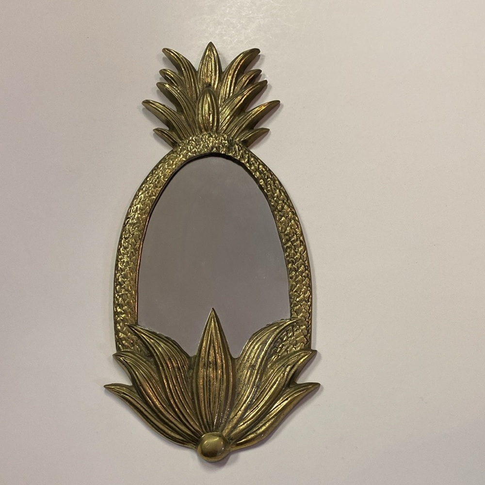 Vintage solid brass mirror.